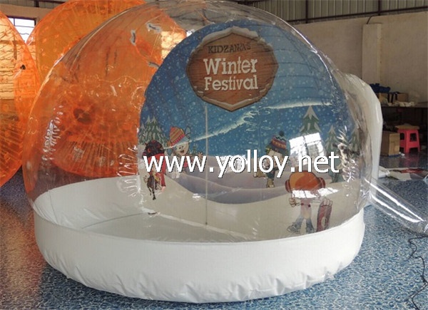 Inflatable snow globe for holiday decoration