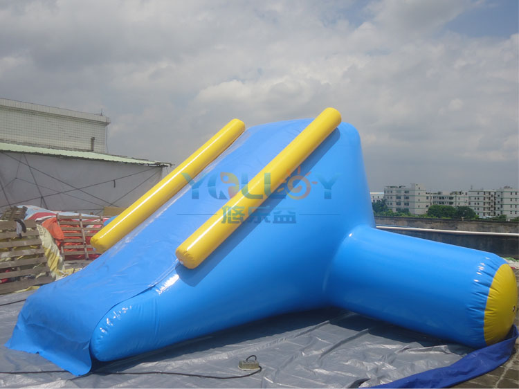 blue inflatable slide in water