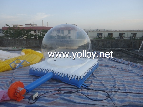 Inflatable snow globe with air bouncy mat