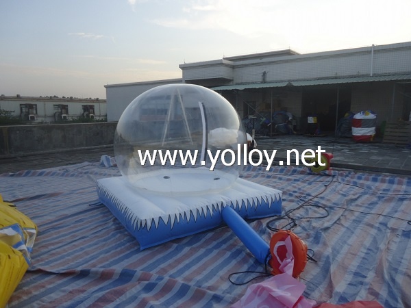 Inflatable snow globe with air bouncy mat