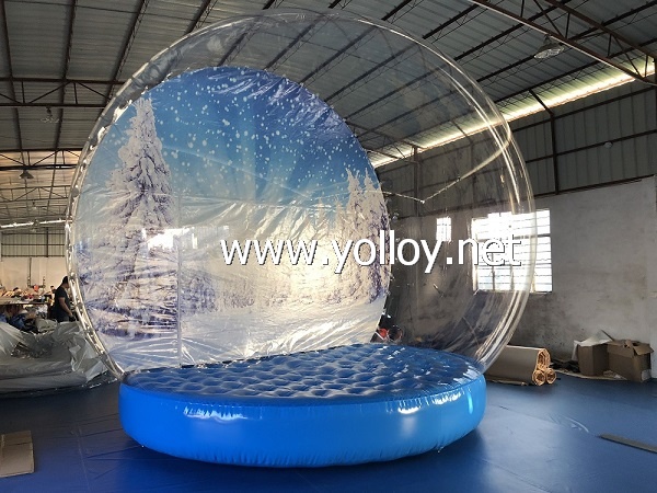 Inflatable christmas snow globe