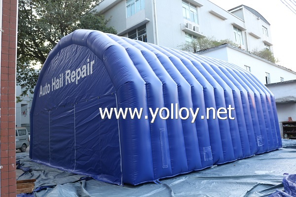 Blue inflatable auto hail repair tent