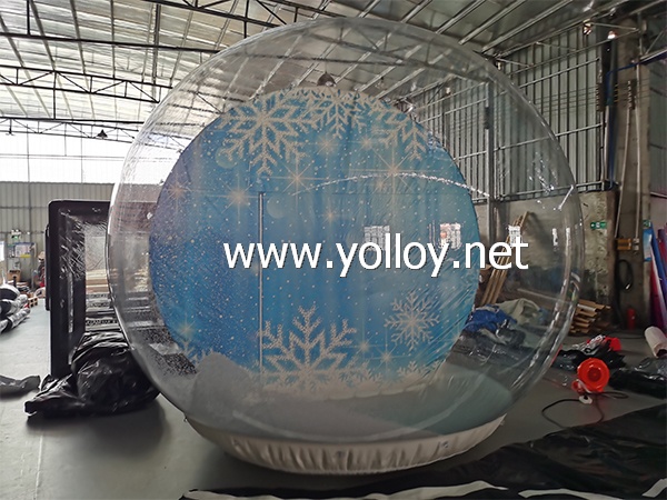 Inflatable snow globe tent with snow