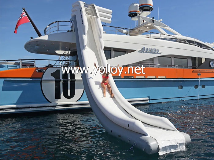 Inflatable dock slide into water
