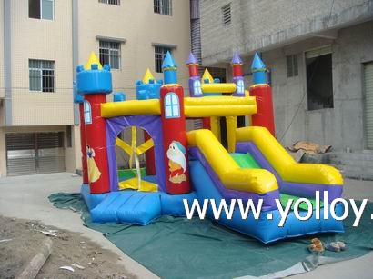 Large blue inflatable slide with bouncy house