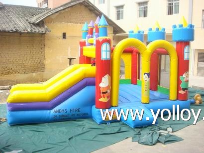 Large blue inflatable slide with bouncy house