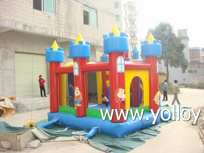 Large blue inflatable slide with bouncy house