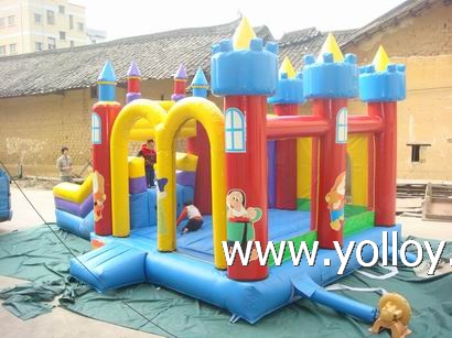 Large blue inflatable slide with bouncy house