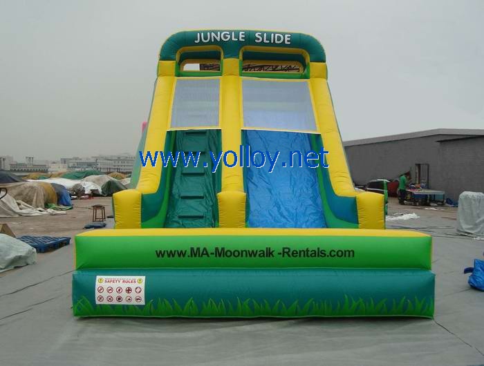 Green inflatable jungle slide for business rentals