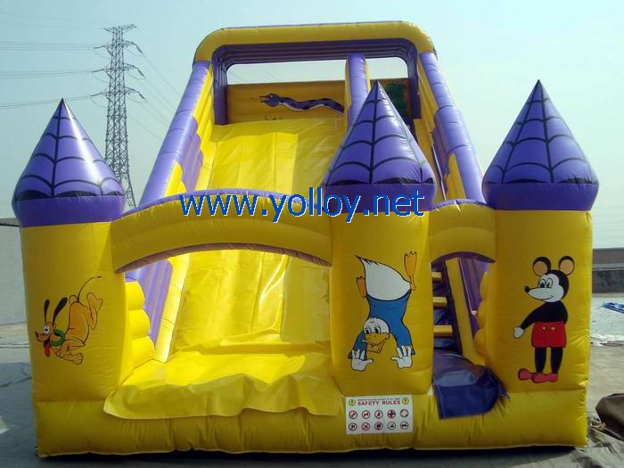 yellow Disney world inflatable castle slide