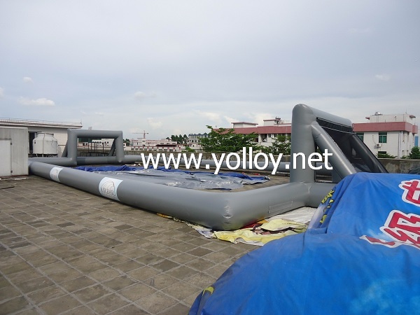 Gray inflatabale soccer football court without flooring