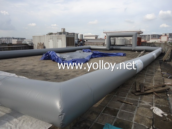 Gray inflatabale soccer football court without flooring