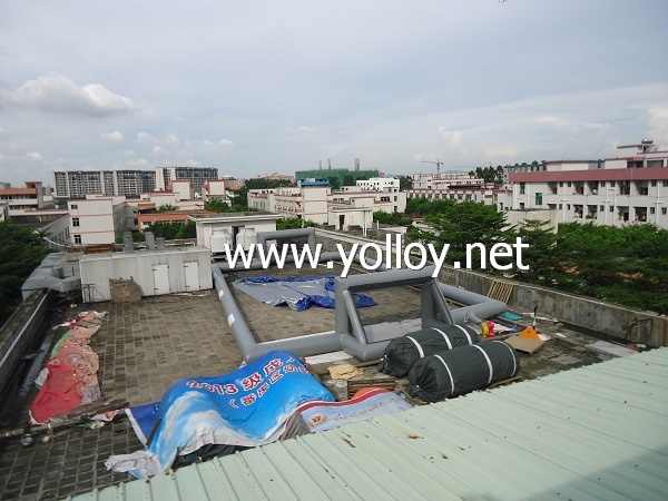 Gray inflatabale soccer football court without flooring