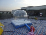 Inflatable snow globe with air bouncy mat