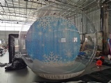 Inflatable snow globe tent with snow