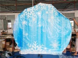 Inflatable snow globe tent with snow