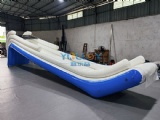 Inflatable dock slide into water