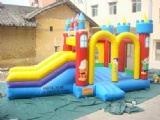 Large blue inflatable slide with bouncy house