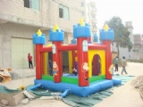 Large blue inflatable slide with bouncy house