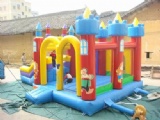 Large blue inflatable slide with bouncy house