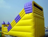 yellow Disney world inflatable castle slide