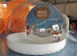 Inflatable snow globe for holiday decoration