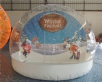 Inflatable snow globe for holiday decoration