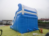Inflatable slide with swimming pool