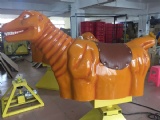 Mechanical dinosaur rodeo for inflatable game