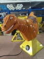 Mechanical dinosaur rodeo for inflatable game